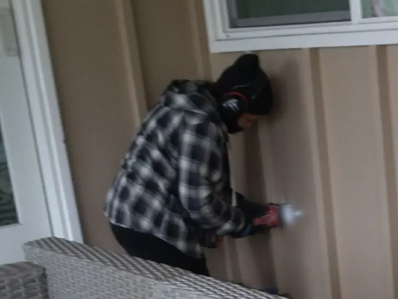 Professional electrician installing an exterior outlet in Cottondale